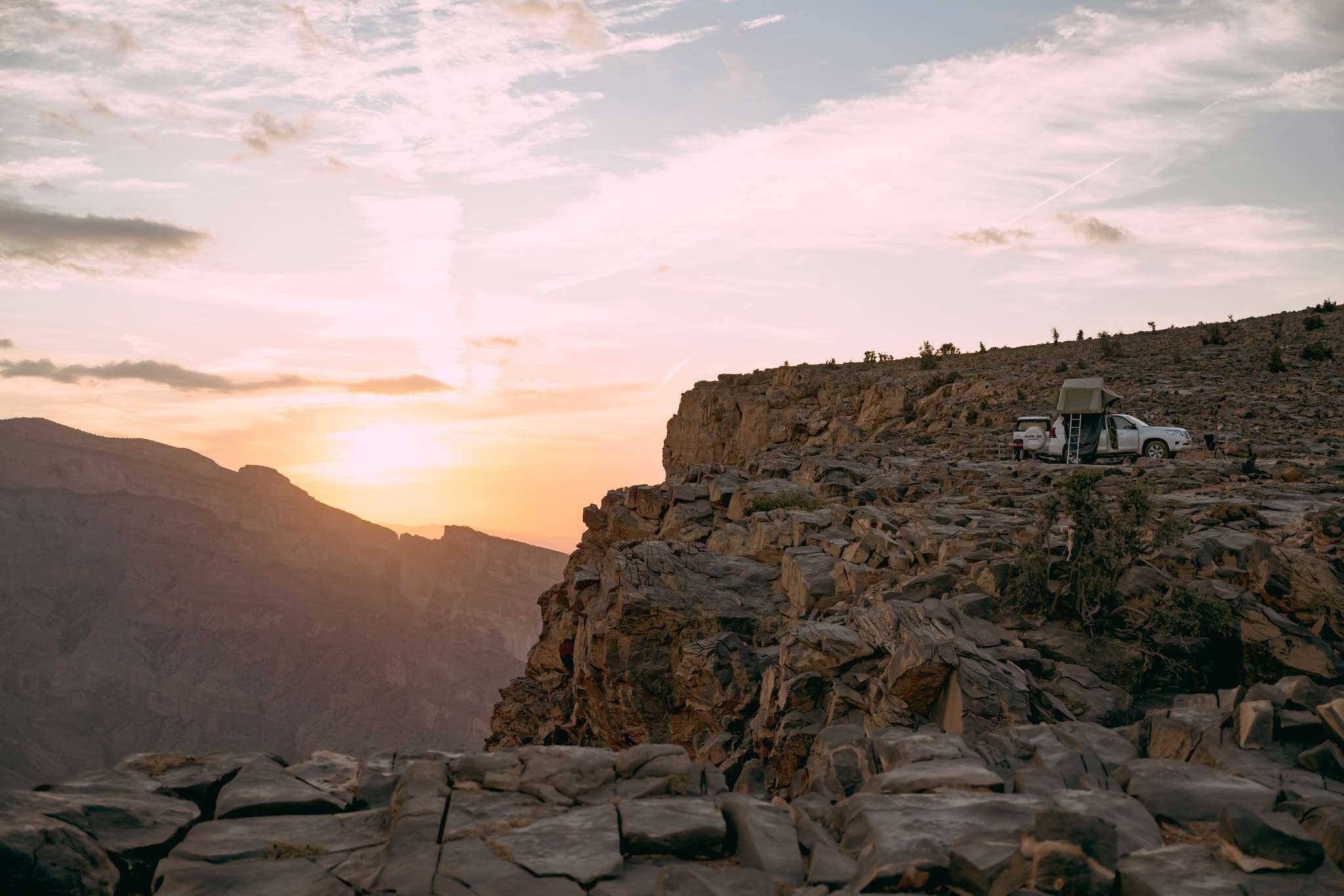 4x4 and rooftop tent facing a canyon in Oman